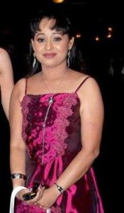 Role as Madhavi "Madhu, Age (46 years)